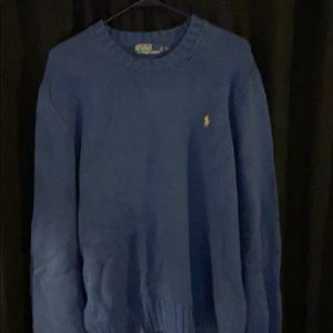 Blue polo by Ralph Lauren sweater.